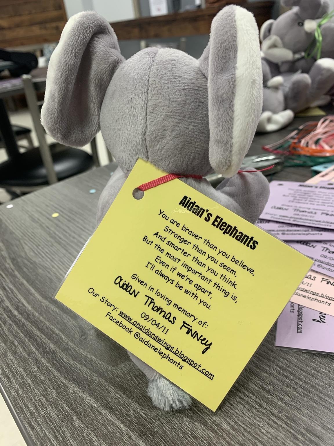 An Aidan's Elephant with its remembrance card